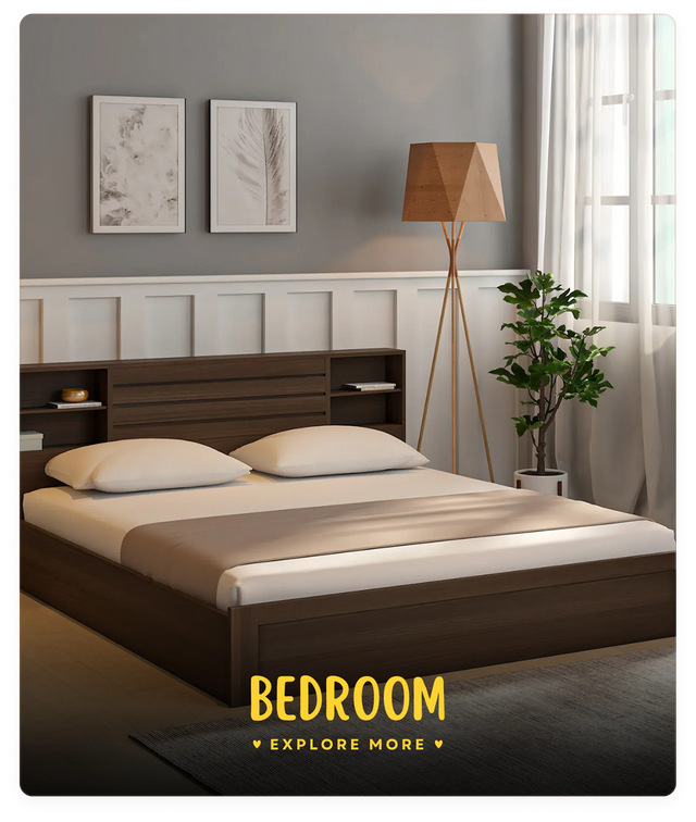 Modern bedroom with a bed, lamp, and decor elements.