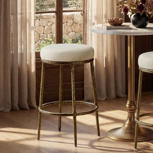 Modern glam counter stool with hand-hammered metal legs