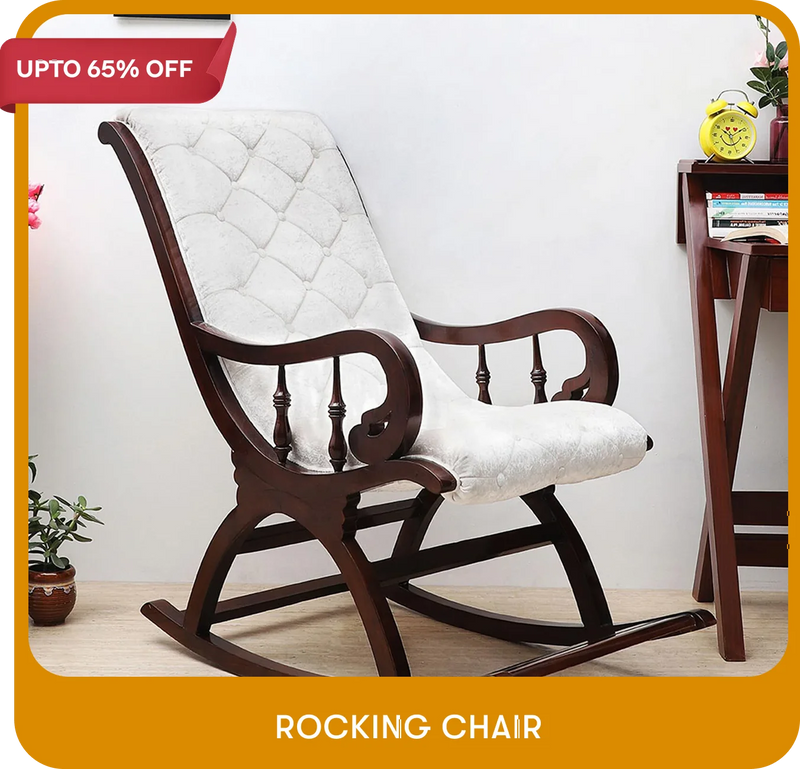Wooden rocking chair with white cushion on a wooden floor