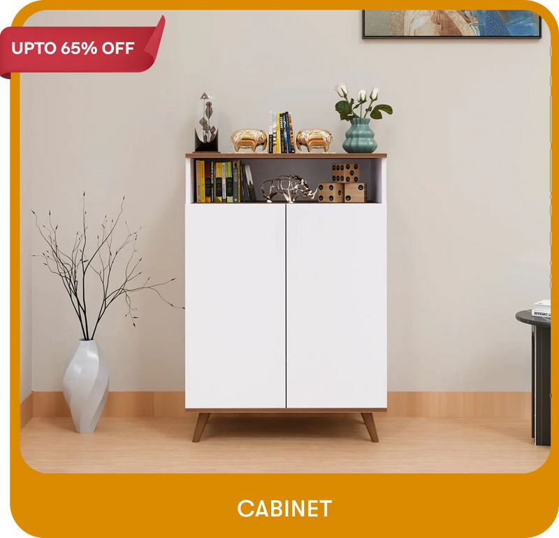 White cabinet with decorative items against a beige wall