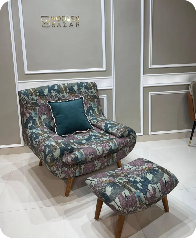 Floral-patterned armchair with matching ottoman in a showroom